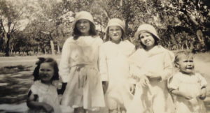 Faye is the one in the middle. This 1936 (or possibly 1937) photo includes her three sisters, and one other, unidentified girl.